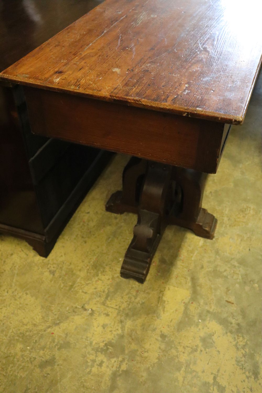 A Gothic style pitch pine two drawer side table, width 100cm depth 55cm height 83cm